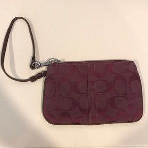 Purple COACH wristlet